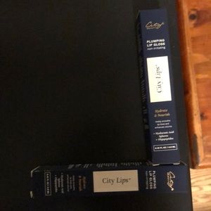 New in Box. City Lips plumping clear lip gloss - 2 tubes.